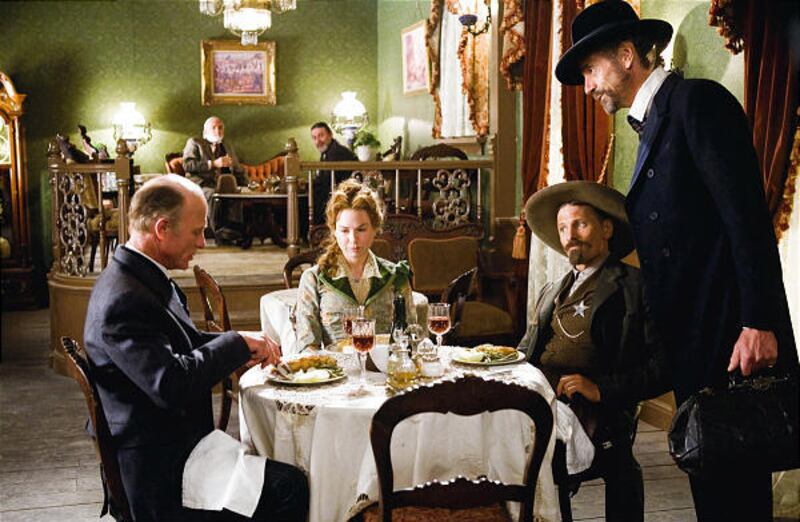 Ed Harris, left, as Virgil Cole, Renee Zellweger as Allison French, Viggo Mortensen as Everett Hitch and Jeremy Irons as Randall Bragg in the new Western "Appaloosa." Harris also directed the film.