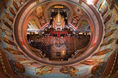 Russian Orthodox believers line up to kiss the relics of Saint Nicholas, center, in the Christ the Savior Cathedral in Moscow, Russia, Tuesday, May 23, 2017. Relics of Saint Nicholas, one of the Russian Orthodox Church's most revered figures, arrived in M