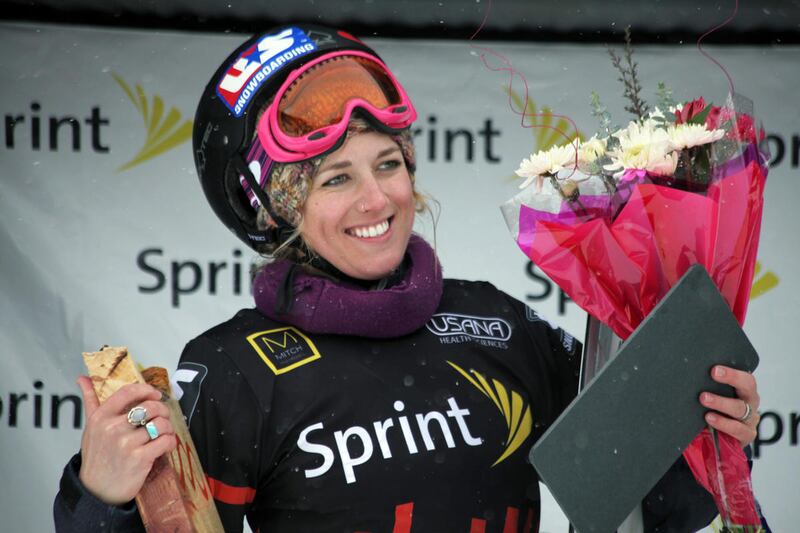 Faye Gulini celebrates after winning the U.S. Grand Prix snowboardcross title, Sunday, Feb. 12, 2012, at Canyons Resort in Park City, Utah.