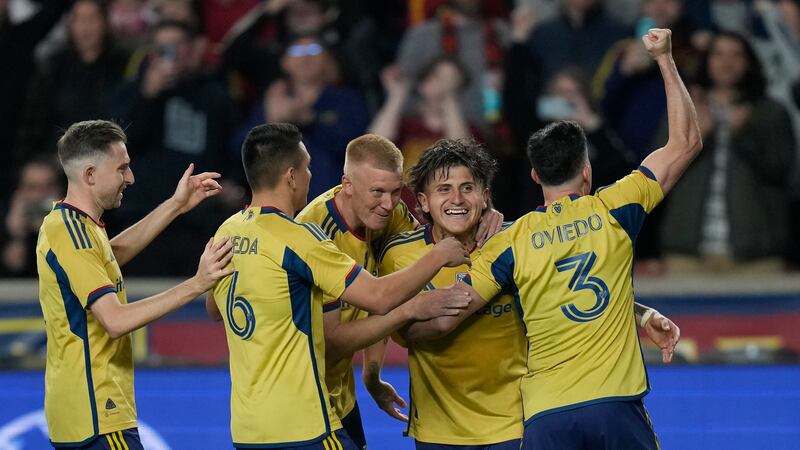 Real Salt Lake midfielder Diego Luna, second from right, celebrates with teammates after scoring against the Houston Dynamo following an overtime penalty shot during an MLS playoff soccer match Monday, Nov. 6, 2023, in Sandy, Utah. (AP Photo/Rick Bowmer)