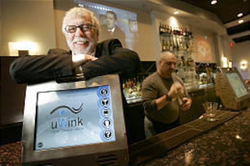Nolan Bushnell, the Ogden-born inventor of "Pong" in the 1970s, hangs out at his new restaurant, uWink, in Woodland Hills, Calif.