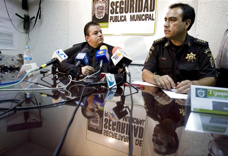 Tijuana Police Director Julian Leyzaola, right, speaks alongside city Security Secretary Alberto Capella Sept. 26. Leyzaola replaced the fired Capella on Monday.