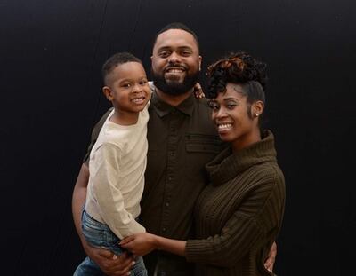 Ethan Woodyard poses with his parents Eric Woodyard and Sharonda Jones, who are the co-authors of Ethan's Talent Search.