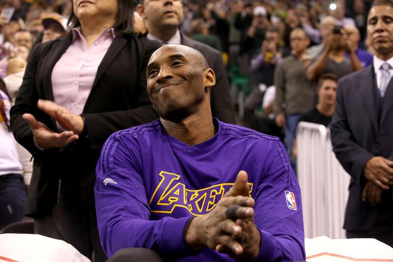 Los Angeles Lakers star Kobe Bryant watches a video honoring his basketball career before the Utah Jazz game at the Vivint Smart Home Arena in Salt Lake City on Monday, March 28, 2016.