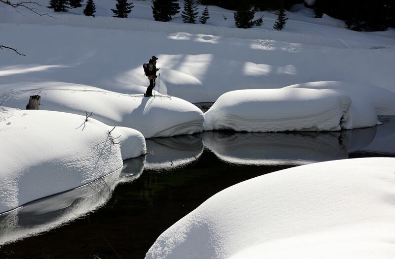 Professional skier John Collinson ski tours around Big Cottonwood Creek.