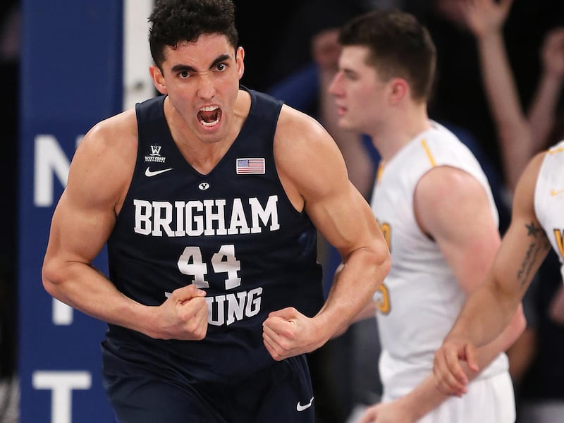 Brigham Young Cougars center Corbin Kaufusi (44) reacts after battling for a rebound and shot as BYU and Valparaiso play in NIT Semifinal action at Madison Square Garden in New York City. BYU loses 70-72 Tuesday, March 29, 2016.