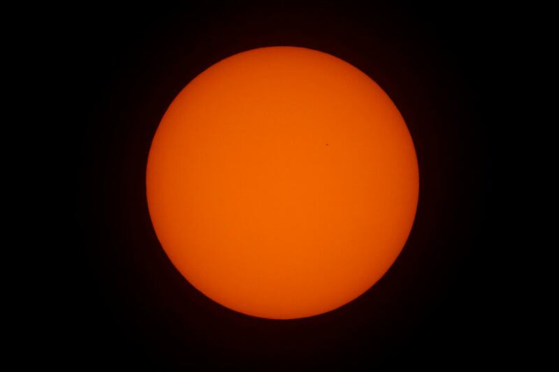 Mercury is pictured between the Earth and the sun.