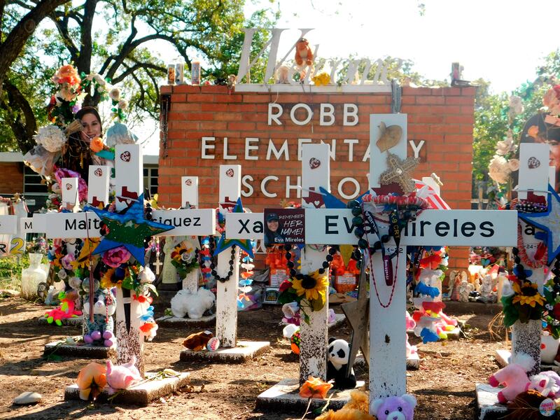 A memorial for the 19 children and two teachers killed in the May shooting sits outside of Robb Elementary School.