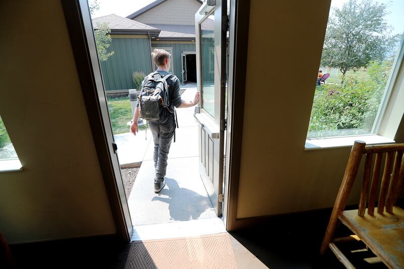Zachary, exits the kitchen after lunch at the WayPoint Academy in Huntsville. The all boys academy helps boys learn how to structure their lives as they cope with anxiety on Tuesday, July 31, 2018.