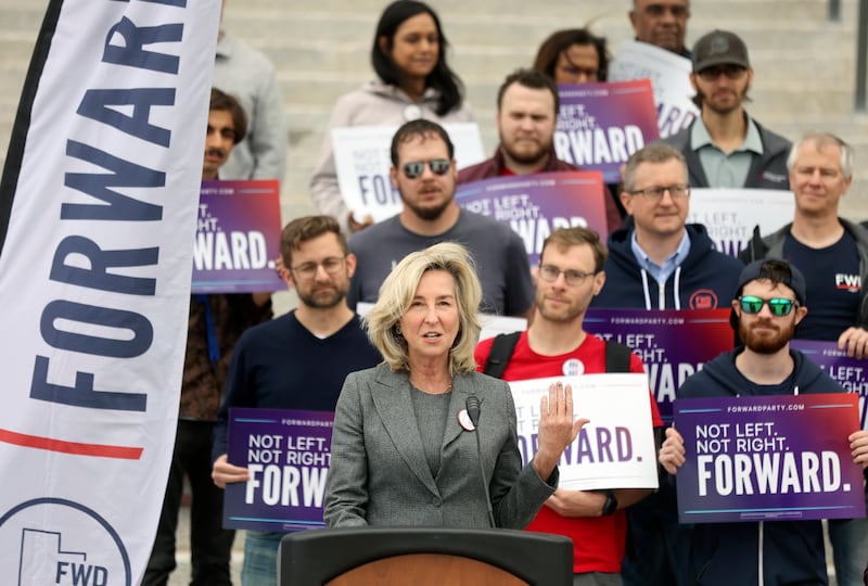 Former Massachusetts Lt. Gov. Kerry Healey, who served under Mitt Romney, speaks during a press conference.