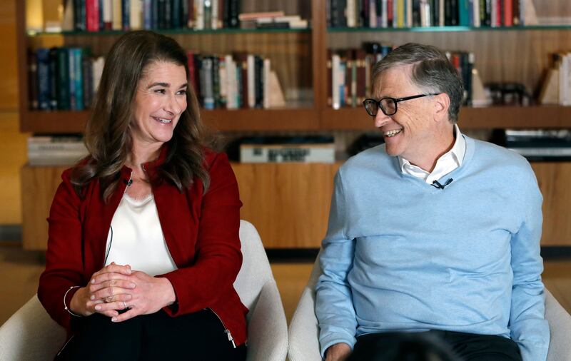 Bill and Melinda Gates smile at each other during an interview in Kirkland, Wash.