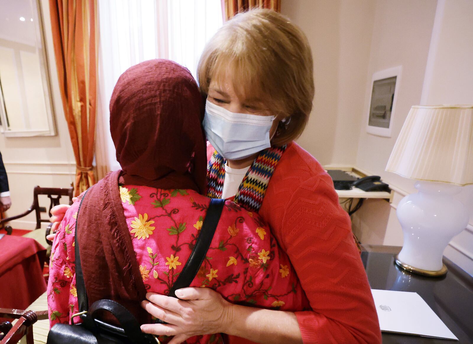 G20 Interfaith Forum: Sister Sharon Eubank, first counselor in The Church of Jesus Christ of Latter-day Saints’ Relief Society general presidency, hugs Dr. Azza Karam, Religions for Peace,