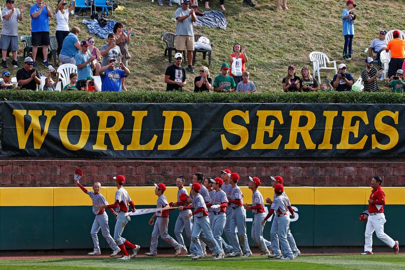 Little league players from Japan take a victory lap after a game in Williamsport, Pa., in 2017.