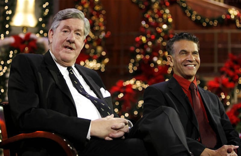 Actor Edward Herrmann, left, and singer Brian Stokes Mitchell talk to media at the LDS Conference Center about last year's Christmas concert. During the concert, Herrman narrated the story of the beloved carol "I Heard the Bells on Christmas Day."