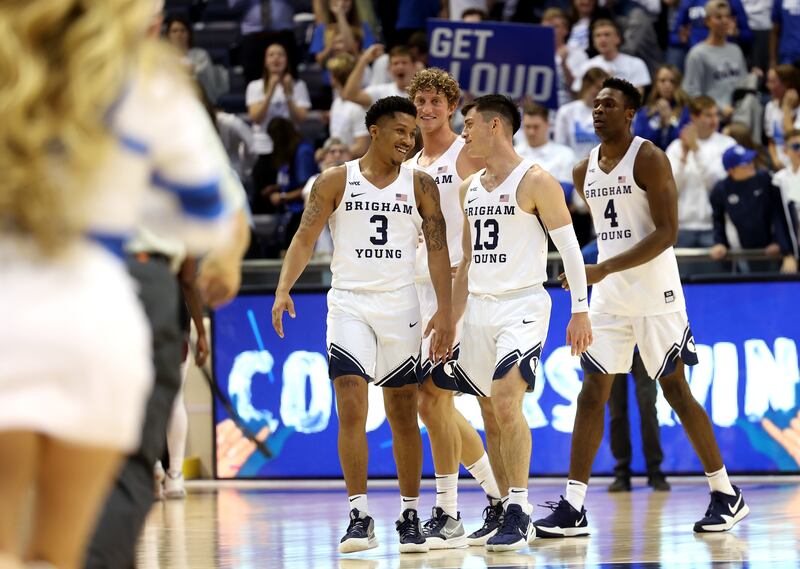 BYU guard Te’Jon Lucas (3) and fellow guard Alex Barcello (13) talk after defeating Texas Southern at the Marriott Center.