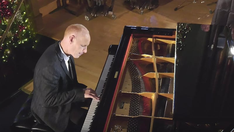 Jon Schmidt plays the piano in The Piano Guys' new music video, "Ode to Joy to the World."