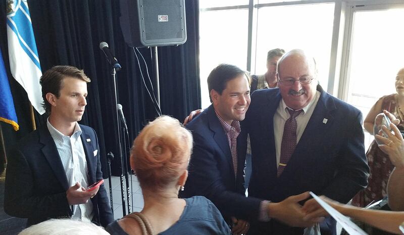 Republican presidential hopeful Sen. Marco Rubio, third from left, shakes hands with attendees at a town hall meeting in Carson City, Nev. on Tuesday, Sept. 1, 2015. The campaign stop was part of a two-day swing through northern Nevada. The Florida senato