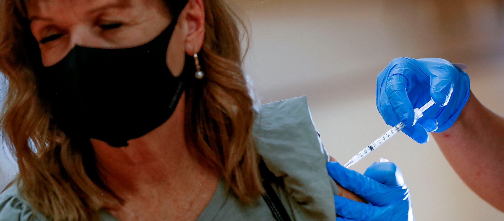 Lori Kirk, of Bountiful, gets her second COVID-19 vaccination at the South Davis Senior Activity Center in Bountiful on Wednesday, Aug. 25, 2021.
