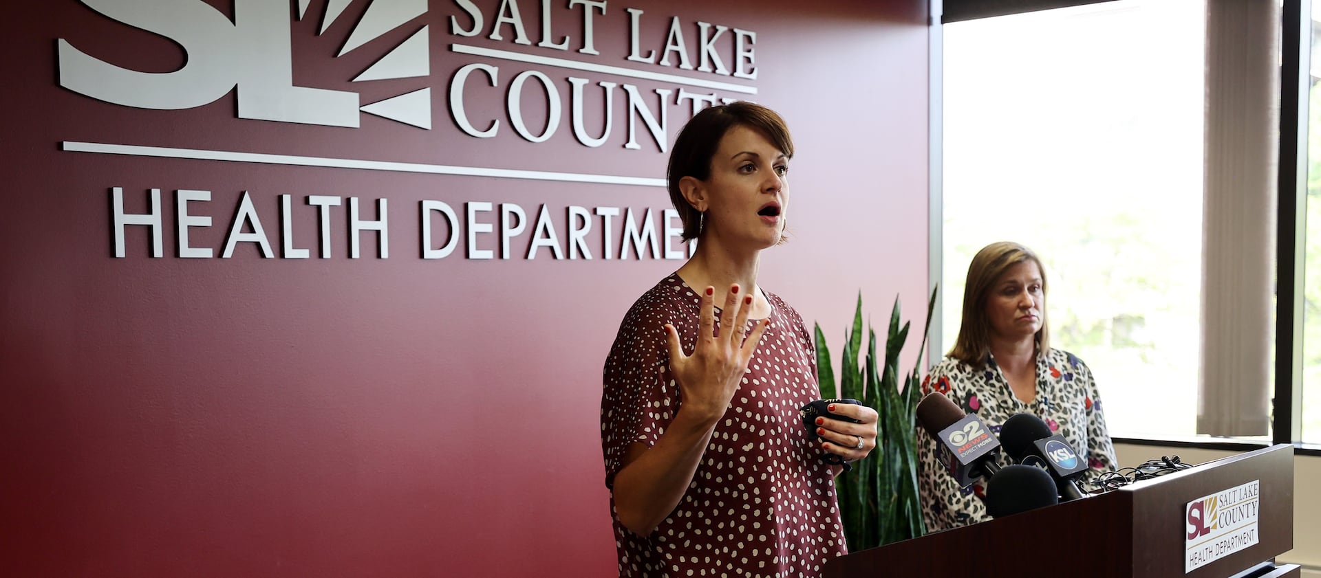 Dr. Angela Dunn discusses schoolchildren and masks as Salt Lake County Mayor Jenny Wilson listens on Tuesday, Aug. 10, 2021.