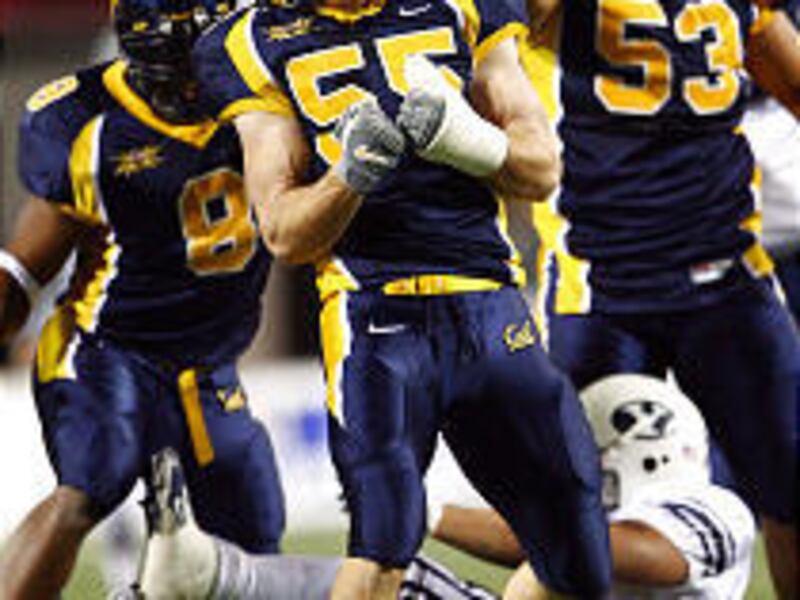 California's Noris Malele celebrates a stop against BYU during the Bear's victory in the Las Vegas Bowl on Thursday night.
