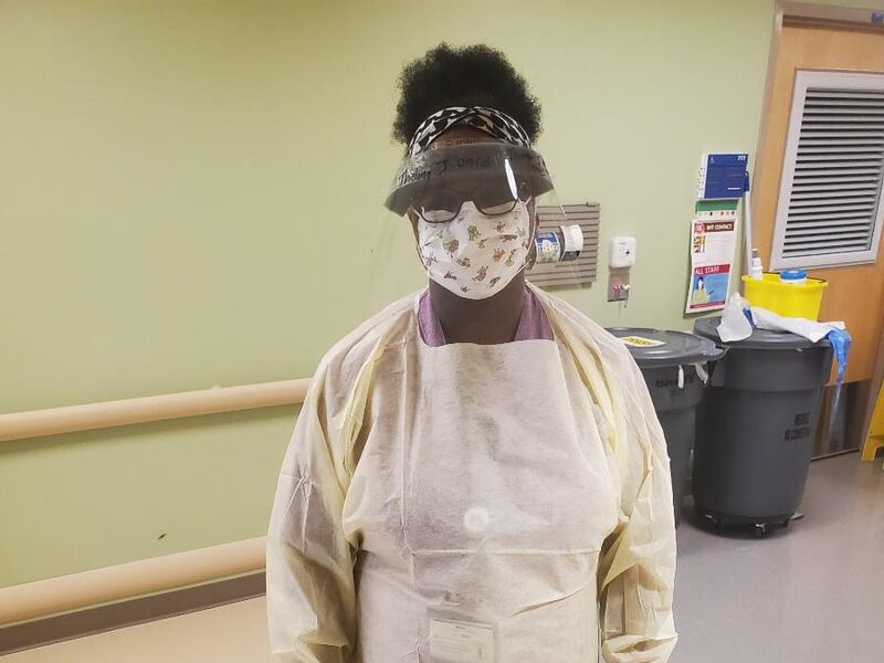 Thelma Jackson works as a custodian on the cancer floor at a children’s hospital in Tampa, Florida. With visitors limited due to COVID, her usual role has expanded.