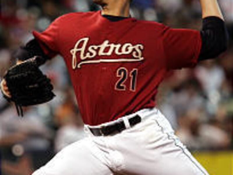 Houston Astros' Andy Pettitte delivers a pitch in the first inning against the Milwaukee Brewers Sunday.