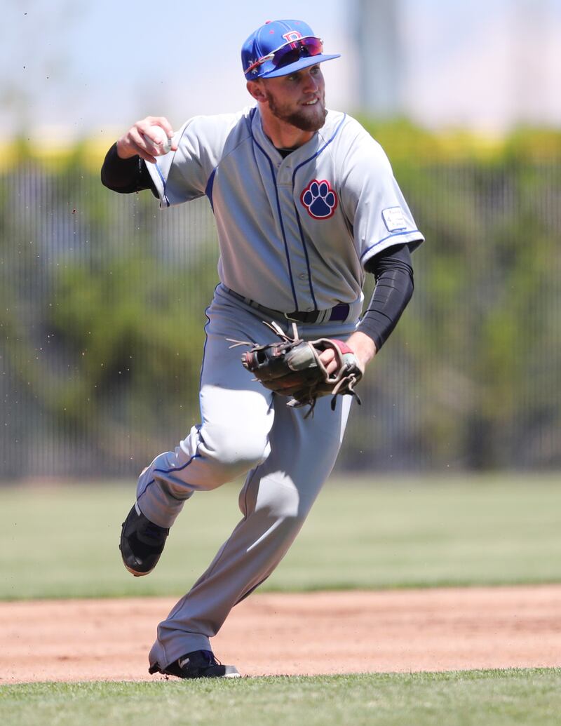 Richfield's Emmitt Hafen scoops up a grounder and makes the throw to first for an out as the Wildcats and Summit Academy play in the 3A Baseball championship baseball game at Kearns High School on Gates Field {on {urc1} Richfield won 9-3.