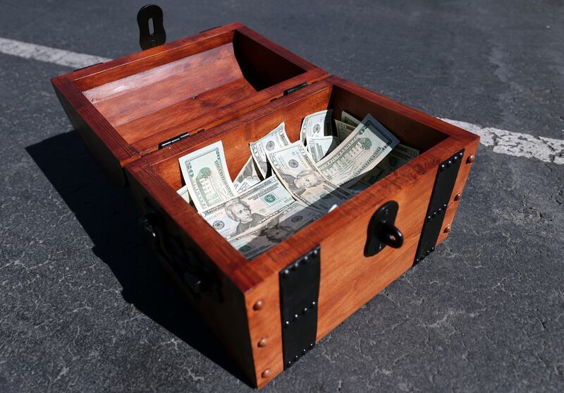A treasure chest filled with $20,000 is pictured during in the Best Buy parking lot in South Salt Lake on May 31, 2022.