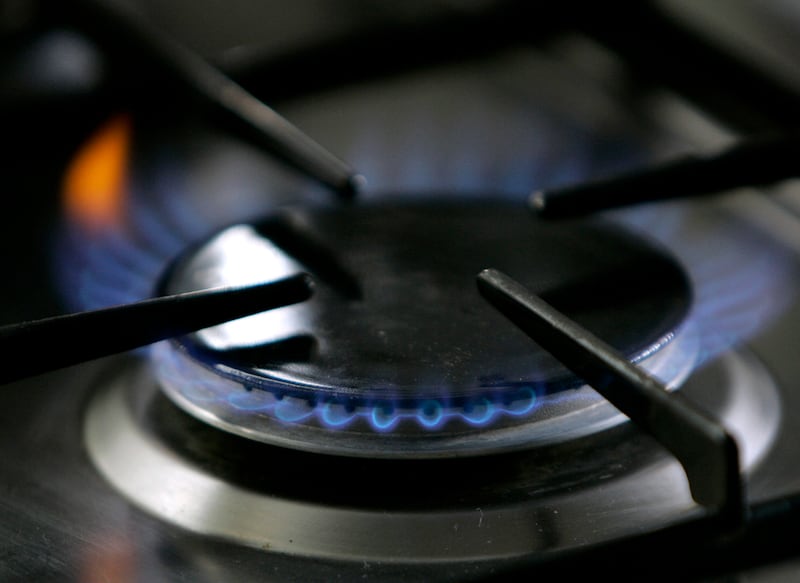  In this Jan. 11, 2006, file photo, a gas-lit flame burns on a natural gas stove.
