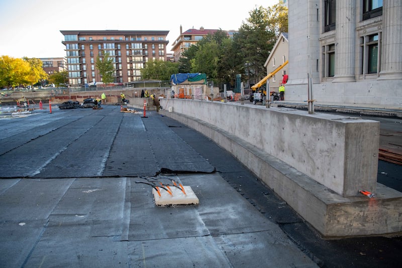 View from the west side of the Church Office Building plaza where a new elliptical structure can be see.
