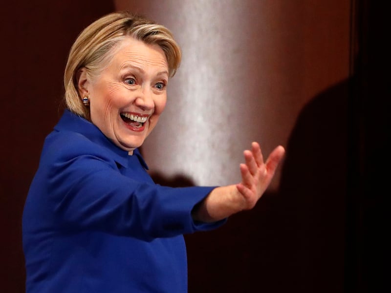 FILE - In this Monday, Jan. 7, 2019, file photo, former Secretary of State Hillary Clinton waves to well-wishers following an appearance at Barnard College with New York Gov. Andrew Cuomo, in New York. Clinton says she won’t run for president in 2020, but