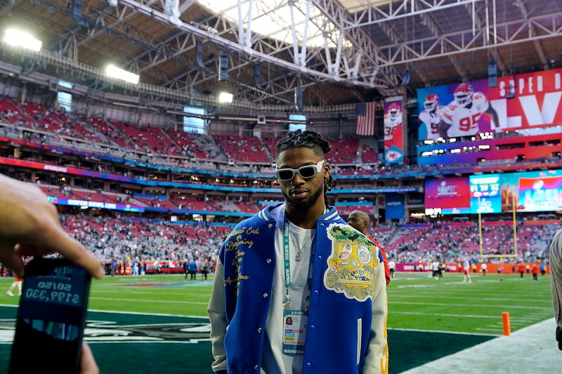 Buffalo Bills safety Damar Hamlin walks on the field before the Super Bowl on Feb. 12, 2023.
