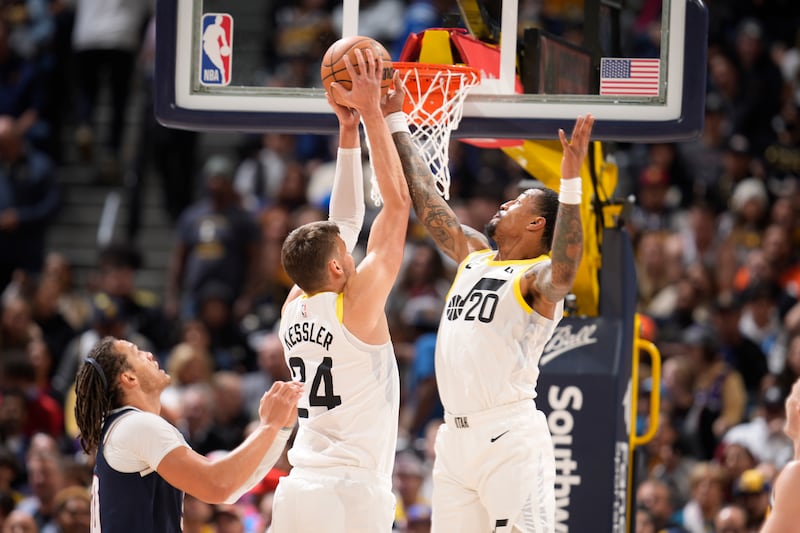 Utah Jazz center Walker Kessler (24) and Utah Jazz forward John Collins (20)