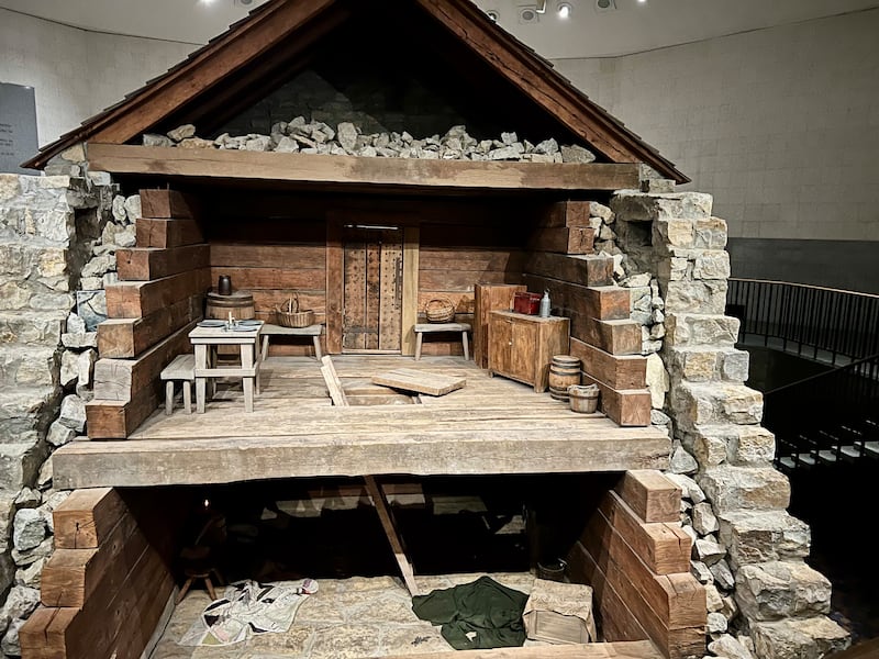 A full-scale replica of Liberty Jail showing its dimensions and construction stands inside the Liberty Jail Visitors' Center in Liberty, Missouri, in May 2026.