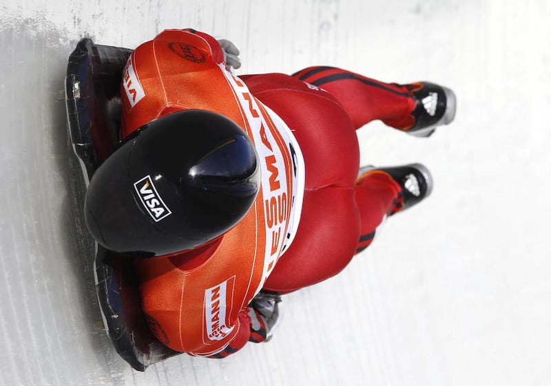 FILE - In this Dec. 17, 2010, file photo, Canada's Michael Douglas competes in the first heat of the men's World Cup skeleton event in Lake Placid, N.Y.