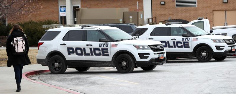 BYU police vehicles are parked outside the department's offices on the BYU campus in Provo on Thursday, Feb. 21, 2019.