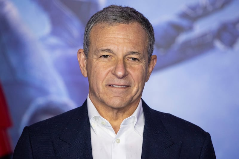 Bob Iger poses for photographers upon arrival at the premiere for the film “Star Wars: The Rise of Skywalker,” in central London, Wednesday, Dec. 18, 2019. Disney announced Sunday that Iger would replace Bob Chapek as CEO.