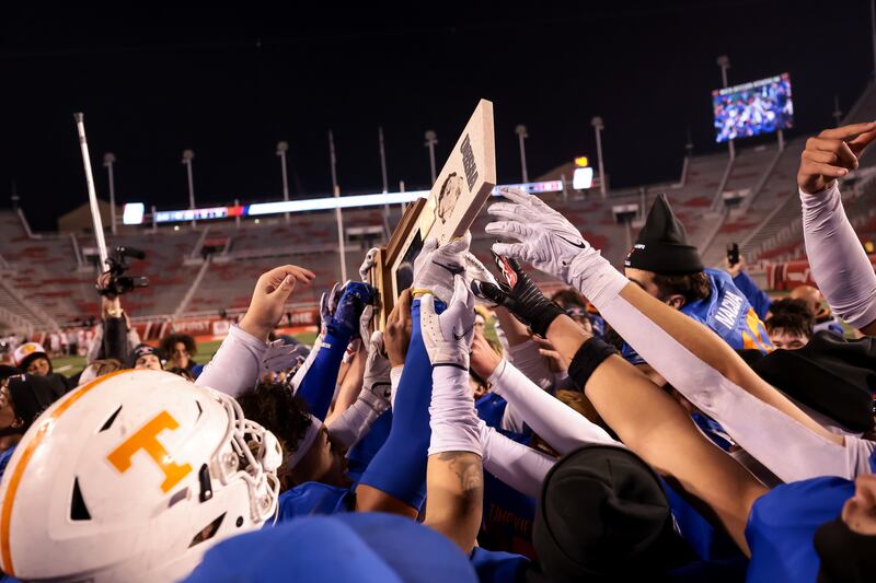 Timpview celebrates after beating Bountiful in the 5A high school football championship at Rice-Eccles Stadium in Salt Lake City on Friday, Nov. 17, 2023.