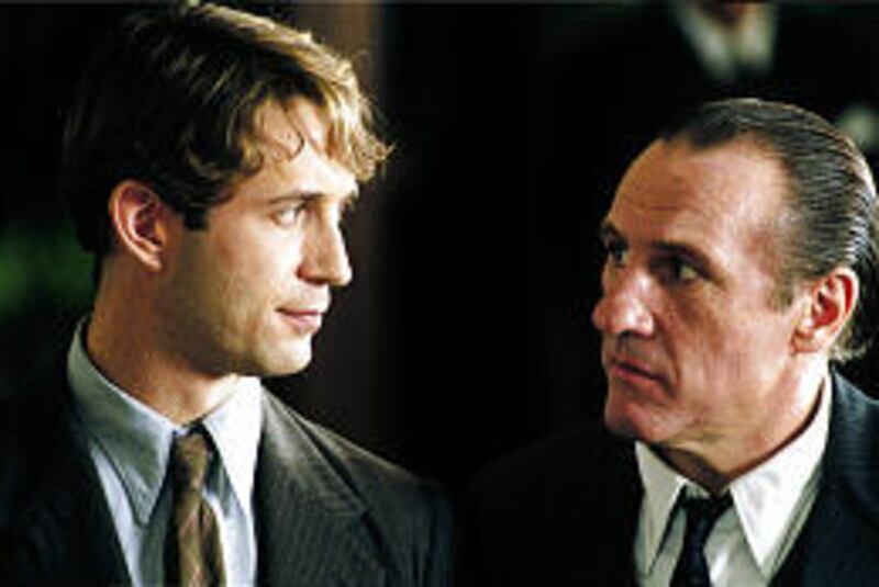 Gregori Derangere, left, and Gerard Depardieu in lame "Bon Voyage."