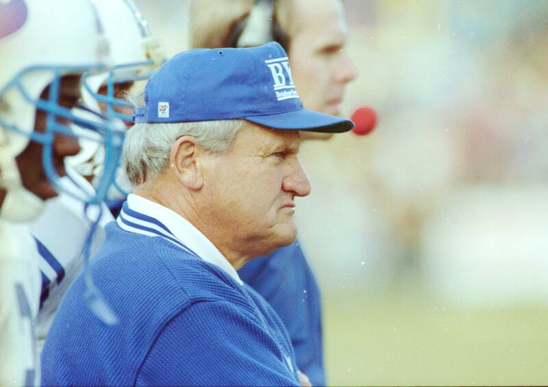 BYU head football coach Lavell Edwards coaches in December 1991.