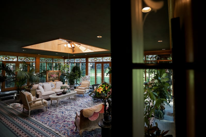 A sun room inside the historic Walker family estate on Walker Lane in Holladay is pictured on Thursday, Aug. 9, 2018. The home was originally built in 1895 by the Walker family and has been occupied by Jeff and Nancy Flamm and their family since 1997.