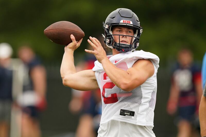 Mississippi quarterback Jaxson Dart (2) readies to pass during an NCAA college football practice, Wednesday, Aug. 3, 2022, in Oxford, Miss.
