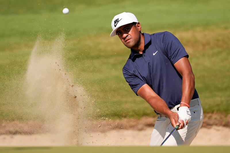 Tony Finau hits from the bunker on the 16th hole during the first round of the U.S. Open golf tournament Thursday, June 13, 2024, in Pinehurst, N.C.