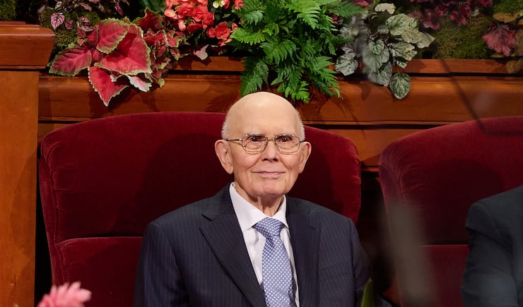 President Dallin H. Oaks, president of the Quorum of the Twelve Apostles, is seated on the stand of the Conference Center before the Sunday afternoon session of the 195th Semiannual General Conference.