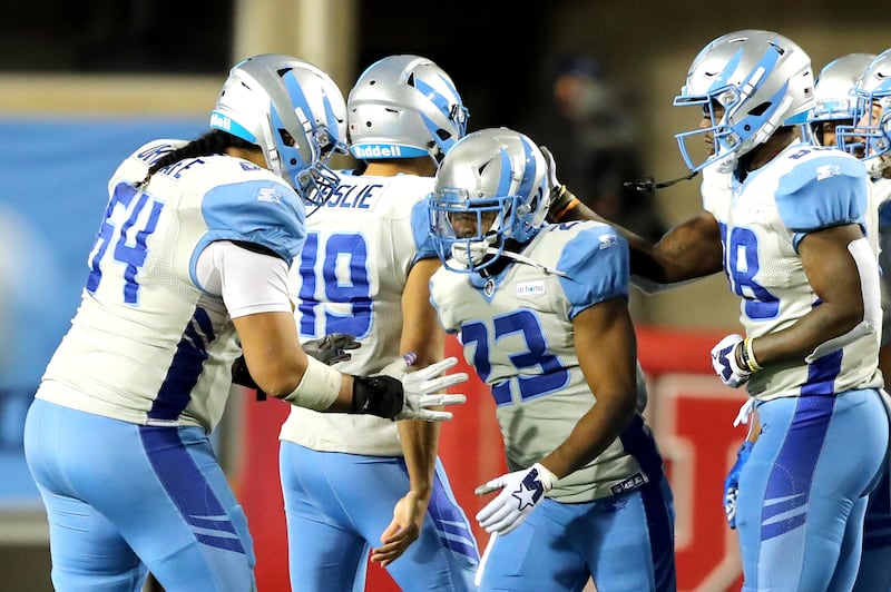 Salt Lake Stallions defensive back Steve Williams (23) is congratulated by teammates after making an interception that sealed the win as as the Salt Lake Stallions play the San Diego Fleet in an Alliance of American Football game at Rice Eccles Stadium in