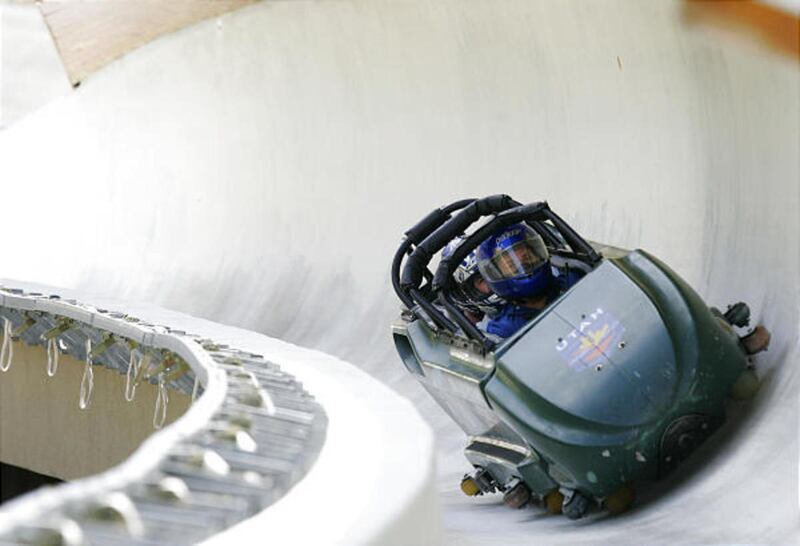 FILE - A powerful gust of wind sent large trash cans, at least one metal chair and trash flying across the Park City High School track Saturday during a training session for U.S. Olympic bobsled and skeleton athletes. None of the athletes were hurt.