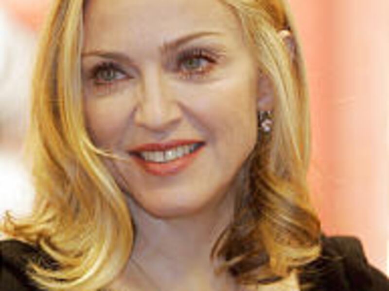 Madonna cracked three ribs, broke<BR> a collarbone and a hand on Tuesday.