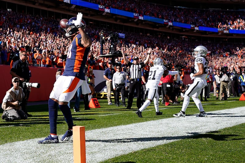 Denver Broncos wide receiver Tim Patrick scores a touchdown against the Las Vegas Raiders.