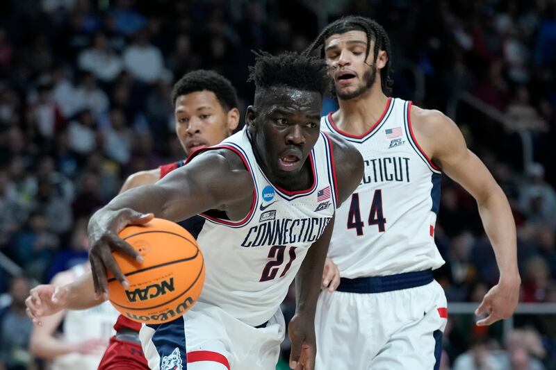 UConn’s Adama Sanogo rebounds in a game against Saint Mary’s in the NCAA Tournament, Sunday, March 19, 2023.