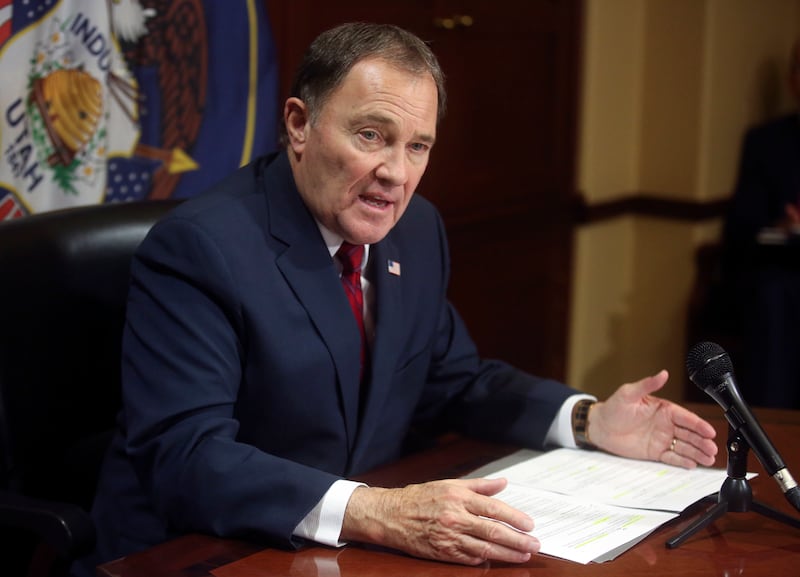 FILE - Gov. Gary Herbert speaks to members of the media about tax reform and other current affairs at the Capitol in Salt Lake City on Thursday, Feb. 14, 2019. Herbert on Monday signed into law a bill to ban abortions in Utah after 18 weeks.